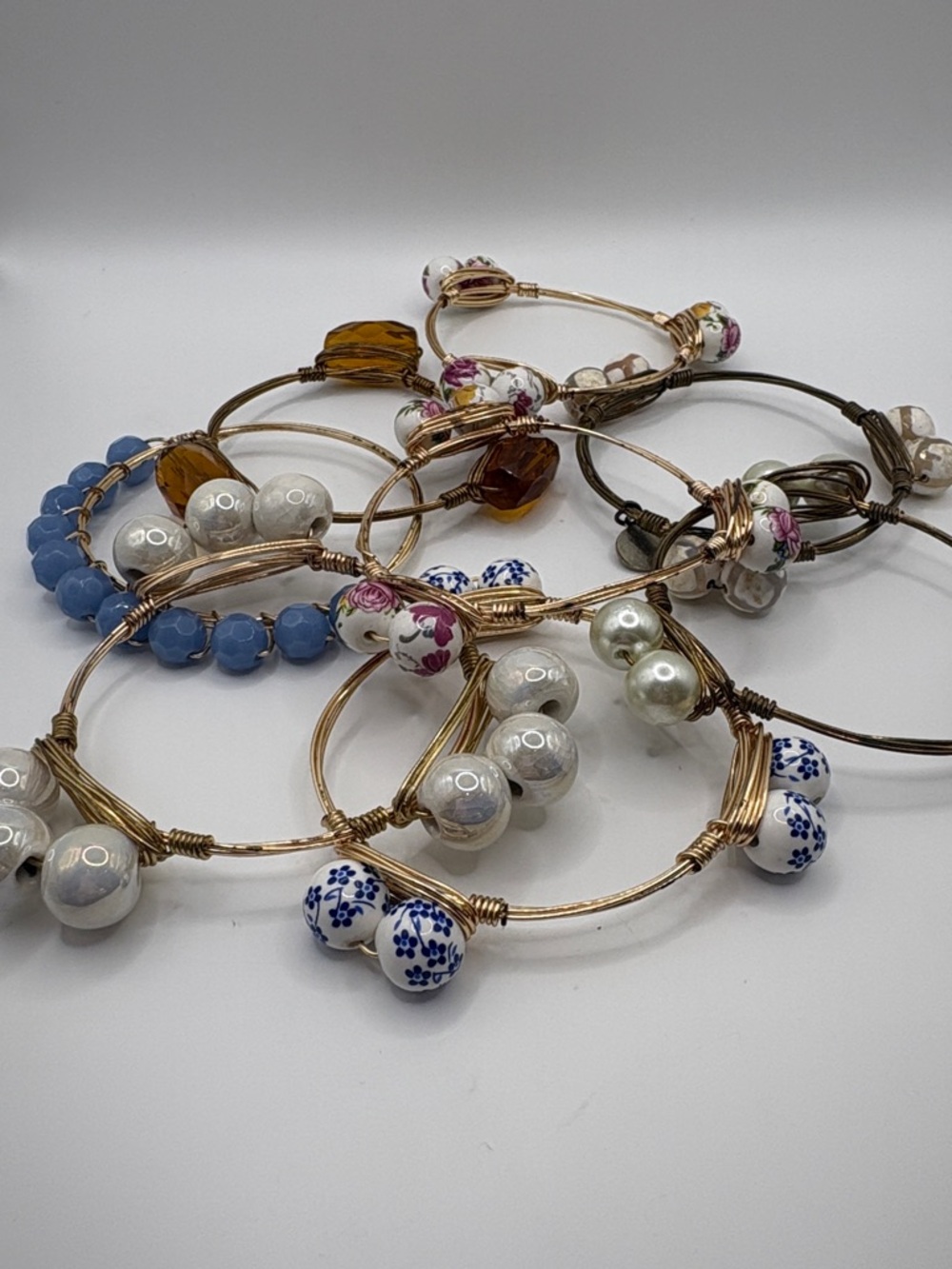 8 pcs Bourbon and Bowties Multicolor Ceramic, Pearl & Amber Wire-Wrap Bracelets